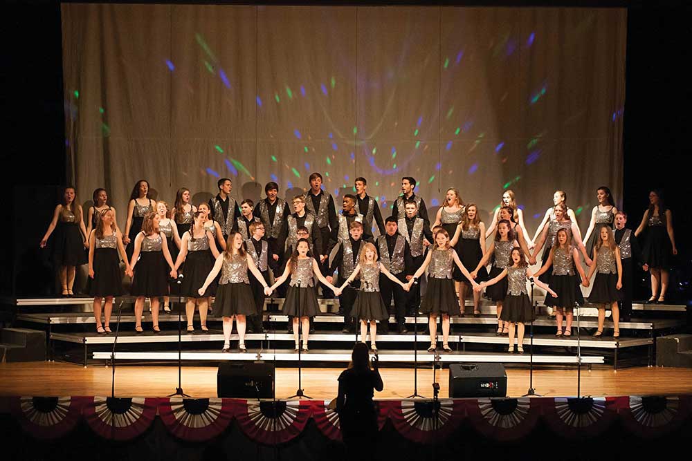 The Sound Company Show Kids Choir performs at the Grove Theater (below), which was founded as a result of the Manhattan Project in Oak Ridge, TN.