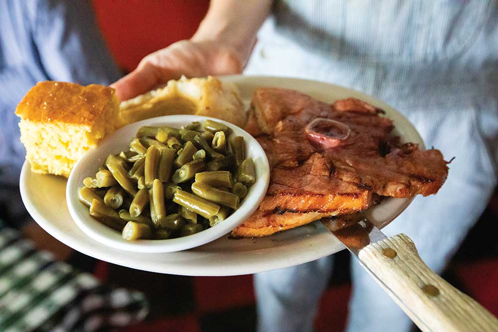 Located on the historic Square in Oxford, MS One of Eli Manning's favorite restaurants, Ajax has been named "Best Downhome Soul Food” by Mississippi Magazine three years in a row, in addition to the magazine's "Best Cornbread" and "Best Plate Lunch" titles. Ajax holds many local titles, including The Oxford Eagle's "Best Plate Lunch," "Best Burger," "Casual Dining" and "Best of the Best." Needless to say, Ajax is definitely a spot you need to try if you're in Oxford. 100 Courthouse Square, Oxford, MS Incorporated in 1837, Oxford is touted as the “cultural mecca of the South” thanks to its creative community including musicians, artists and writers. The city also boasts a rich culinary scene and is home to the University of Mississippi.