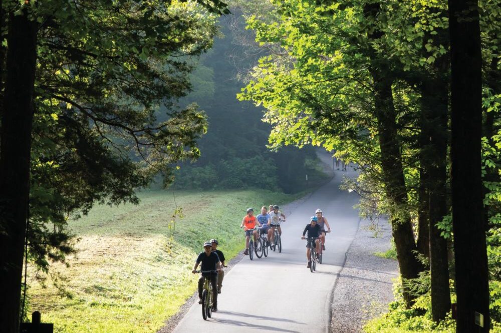 Cyclist ride the loop at Cades Cove during Vehicle-Free Day in Great Smoky Mountains National Park in Townsend, TN.