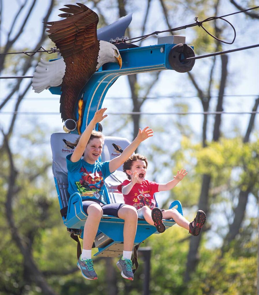 Visitors ride on the new Soaring Eagle Zipline at the Nashville Zoo at Grassmere in Nashville, Tennessee.