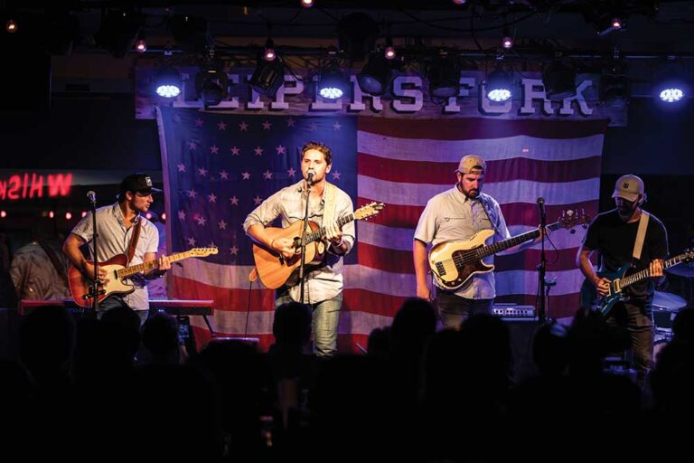 Jake Matthew and his band performs during the open mic night show at Fox and Locke in Leipers Fork.