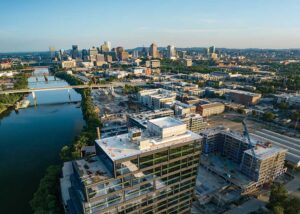 Aerial views of the downtown skyline, including the Neuhoff development, from the Germantown neighborhood of Nashville, Tennessee. Drone photo.