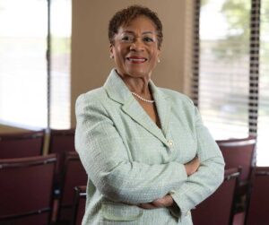 Sharon Green, CEO of Victor Valley Family Resource Center stands in the chapel at her organization's headquarters in Hesperia, California.