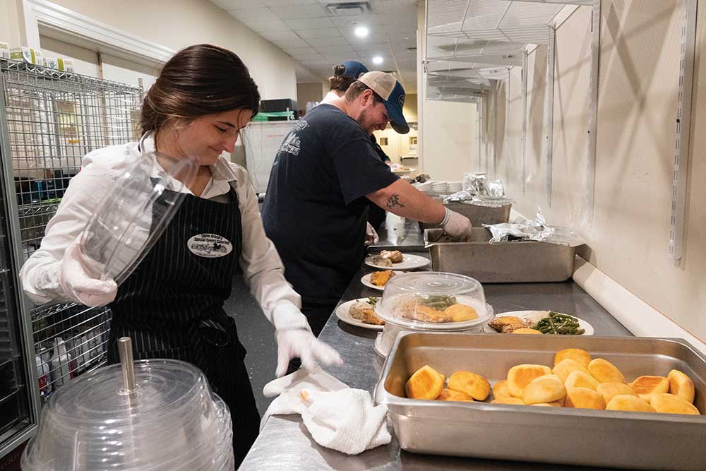 Butch Scott, Taylor Grocery Catering preparing for an event in Oxford, Mississippi June 16, 2023.