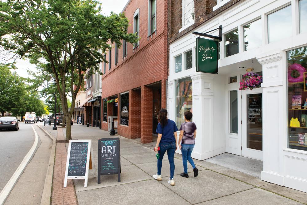 People walk through downtown Maryville, TN.