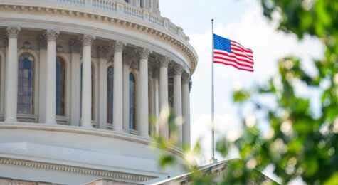 Close-up view of the American Flag on the U.S. Capitol building in Washington D.C. on the East Facade stock photo