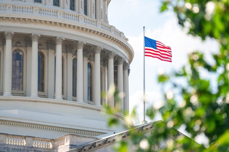 Close-up view of the American Flag on the U.S. Capitol building in Washington D.C. on the East Facade stock photo