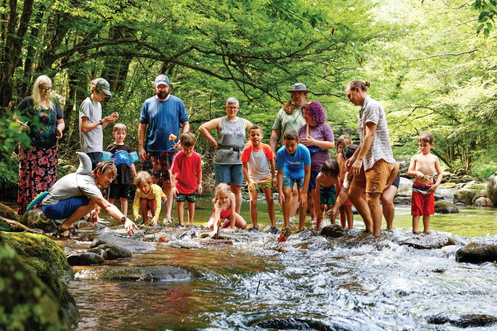Kids playing in the river at Firefly Camp