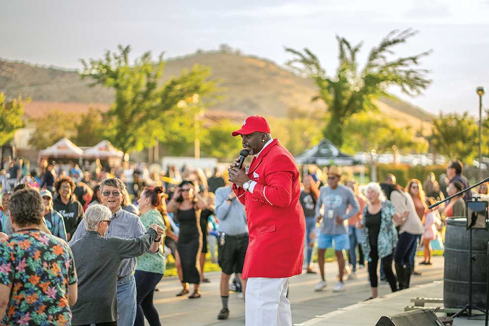 Man performs at Friday Night Concert Apple Valley