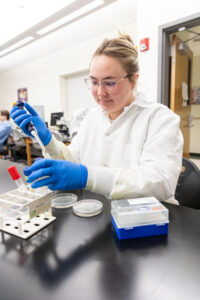 Wartburg College student in Microbiology class.