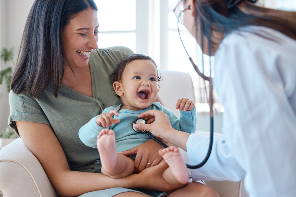 Mother and baby with pediatrician