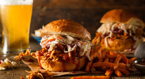 Homemade Pulled Chicken Barbecue Sandwich with Coleslaw and Fries. There are many great restaurants in Greenville NC to try.