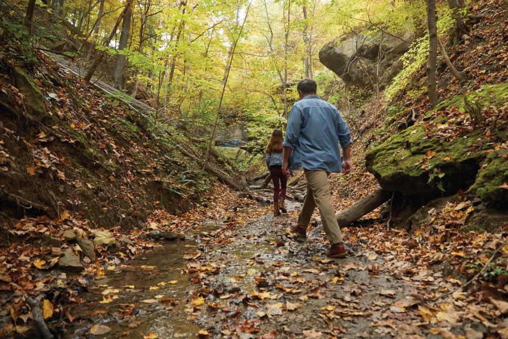 A father and daughter explore Rocky Glen.