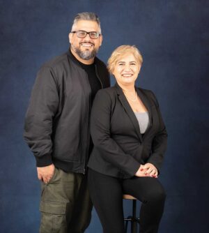 David Bracamonte and partner María Jiménez pose for a photo. David Bracamonte is the founder and principal CEO of Hispanos Emprendedores, an organization dedicated to promoting and supporting Hispanic small-business owners.