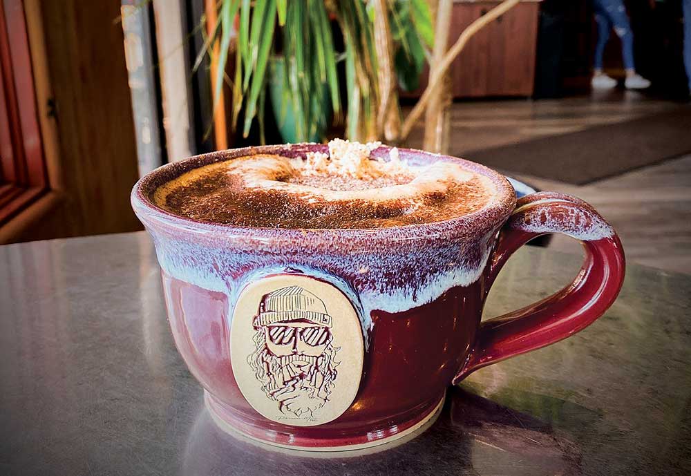Mug of coffee from Java Blue Lakes, a popular spot in Southern Idaho.