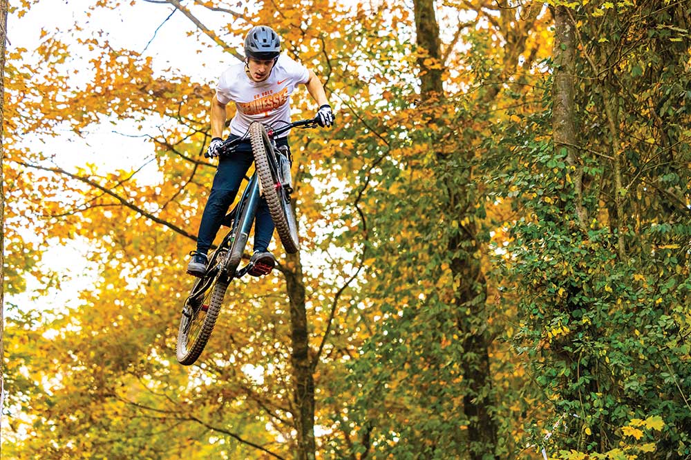 Student members of the mountain biking club ride on a trail at the Baker Creek Preserve on October 19, 2022. Photo by Steven Bridges/University of Tennessee.