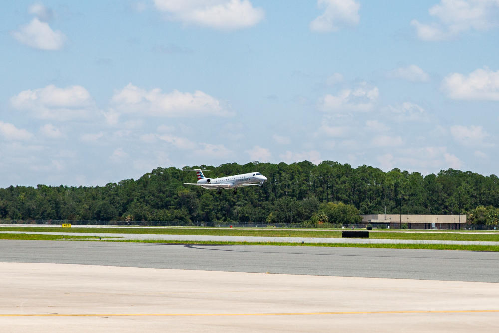 A plane lands at Gainesville Regional Airport.