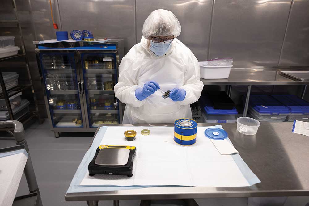 Linda Lemmon tests the quality of Idaho White Sturgeon Caviar at Idaho Springs Foods in Filer, Idaho.