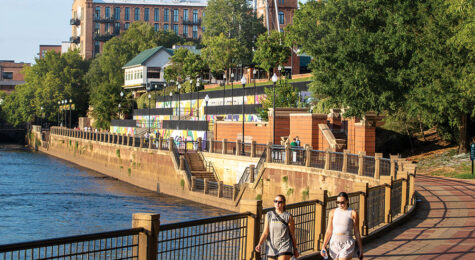 Walking along the RiverWalk in Uptown Columbus.