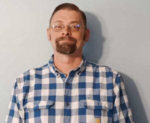 Headshot of Adam Burney, TCAT graduate and Dickson resident