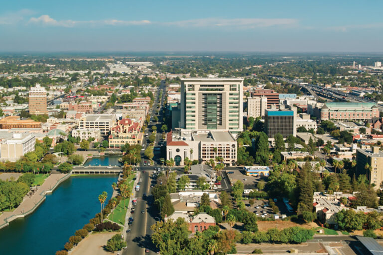 Aerial shot of Stockton, California on a sunny day in autumn. Built during the gold rush, Stockton is a major city in the San Joaquin Valley. Authorization was obtained from the FAA for this operation in restricted airspace.