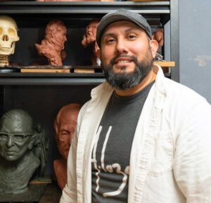 Headshot of Alex Paul Loza in his studio.
