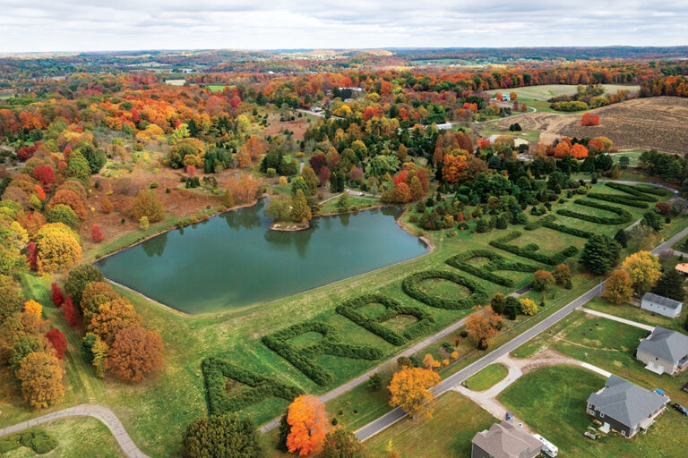 An aerial view of Dawes Arboretum in Newark, OH, is punctuated with fall colors.