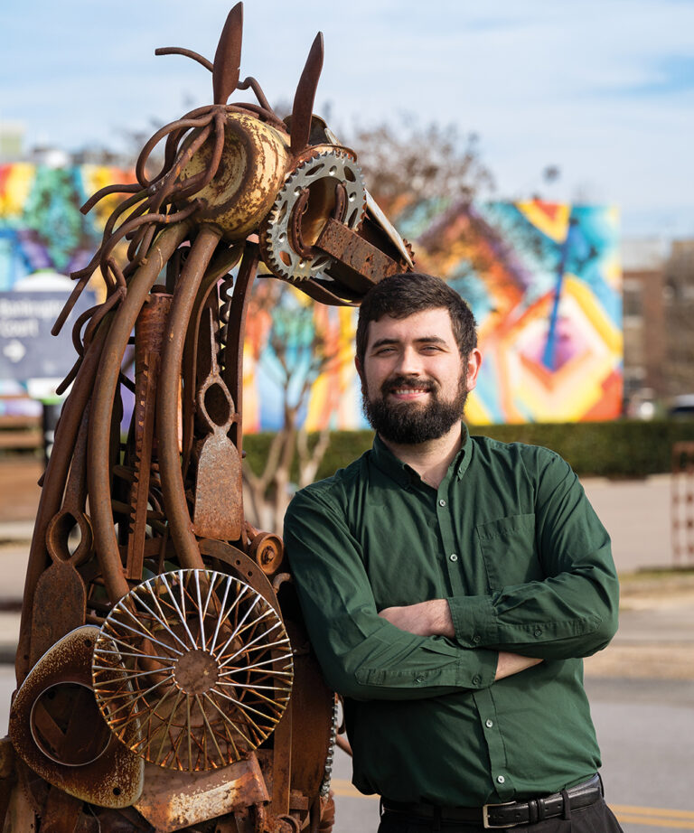Hunter O’Neal poses for a photo in Downtown Greenville, NC.