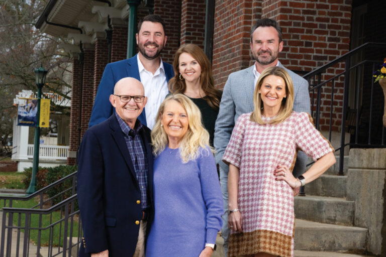 Larry Calhoun, the first dean of ETSU’s Bill Gatton College of Pharmacy, stands with his family.
