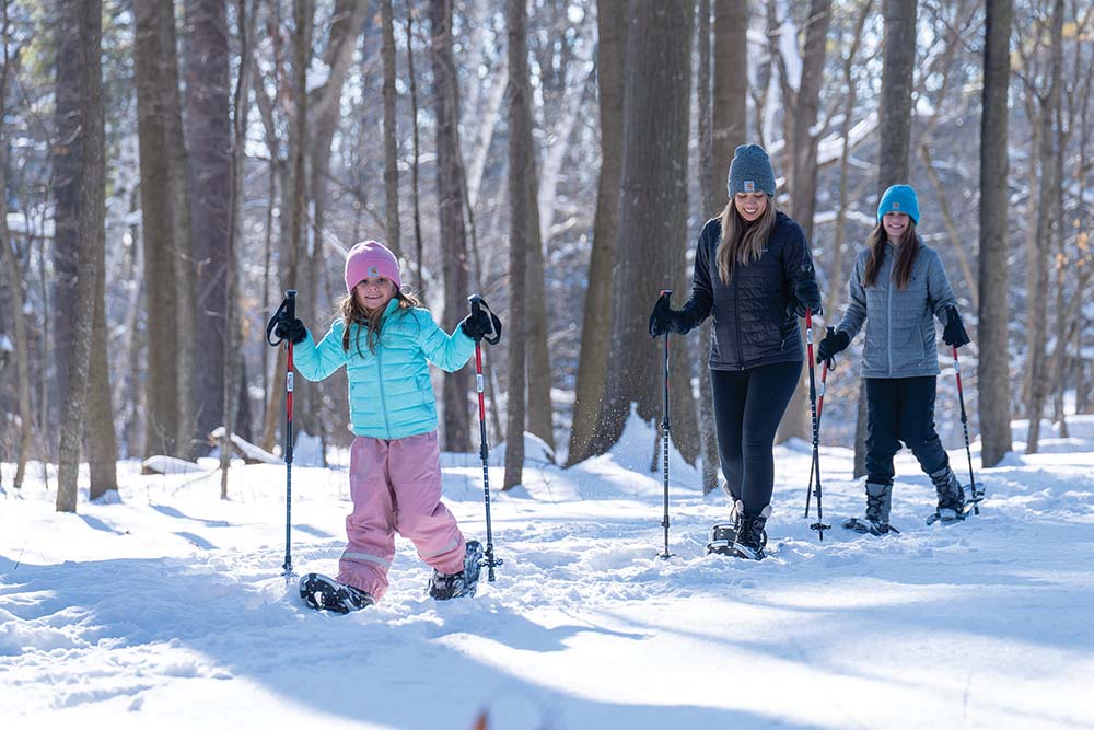 A family snowshoes in Manitowoc County, WI.