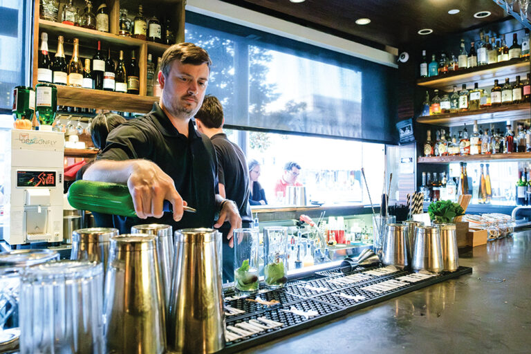 Josh Basham makes cocktails at Dragonfly Sushi & Sake Co. in Gainesville, FL.