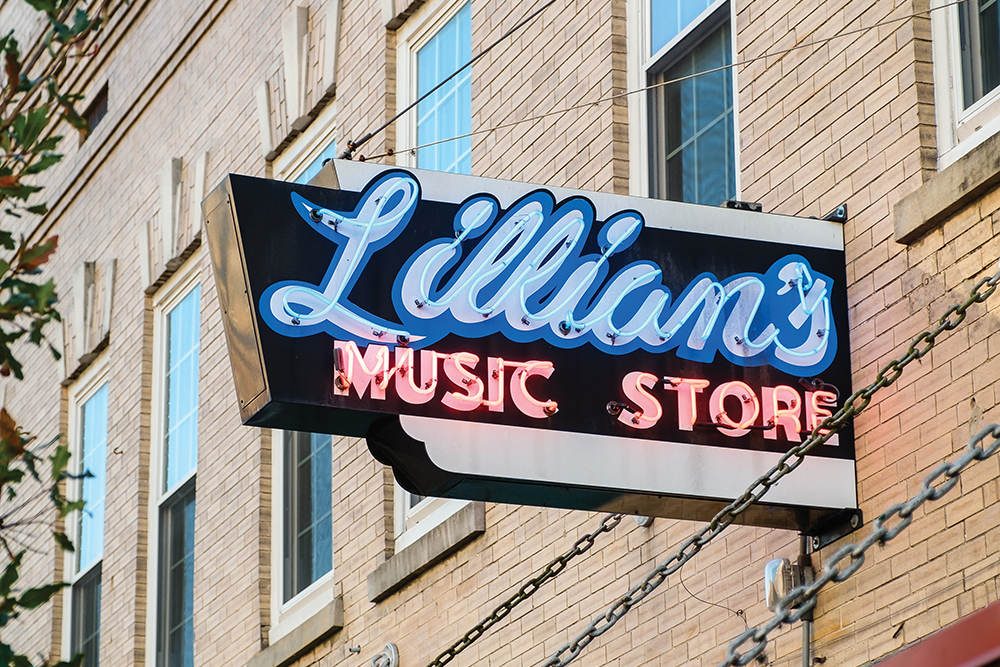A neon sign for Lillian's Music Store in Gainesville, FL. Shopping in Gainesville spans the gamut from malls to thrift shops.