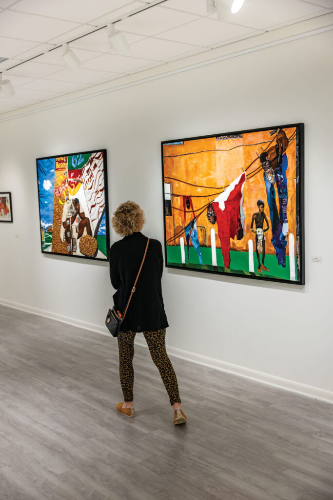 Visitors view artwork in an exhibit by Charles Hume Jr., at Ormond Memorial Art Museum & Gardens in Ormond Beach, FL.