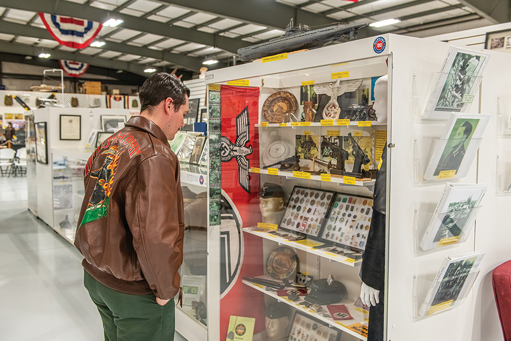 Visitors look at memorabilia at The Warhawk Air Museum in Nampa, Idaho.