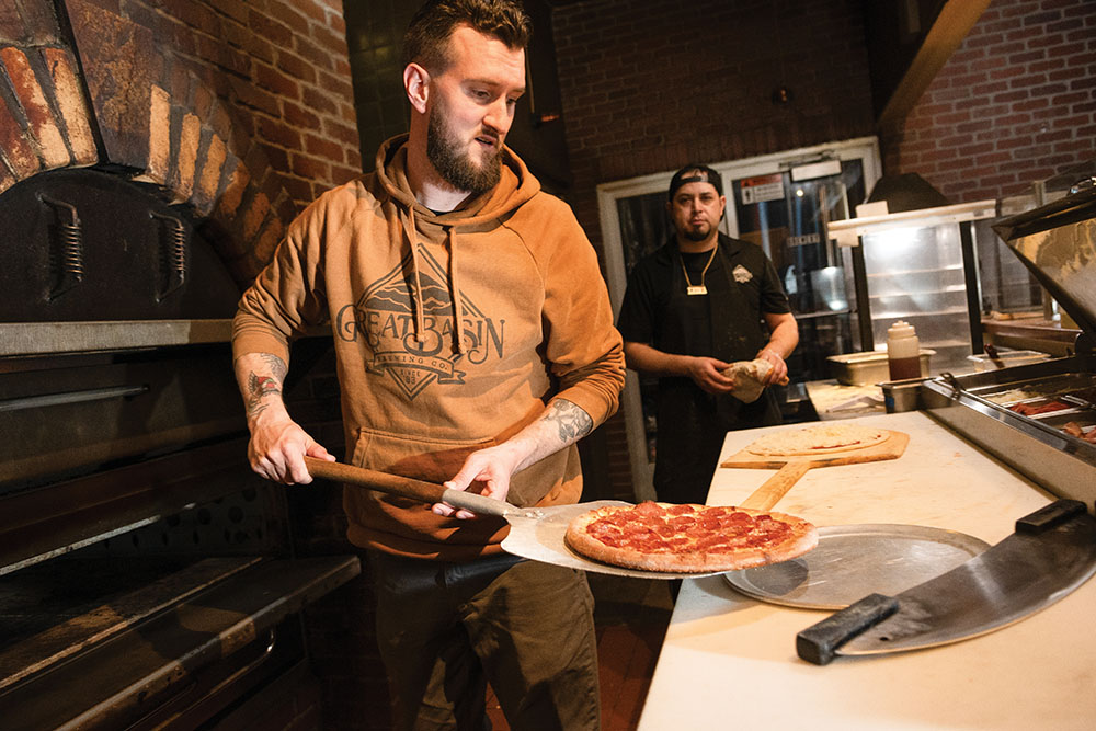 Brennan Best makes a pizza at Great Basin Brewing Co. in Reno, Nevada.