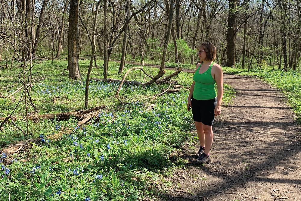 A woman hikes on the Skunk River Greenbelt Trail, which stretches from Story City to Ames, Iowa.