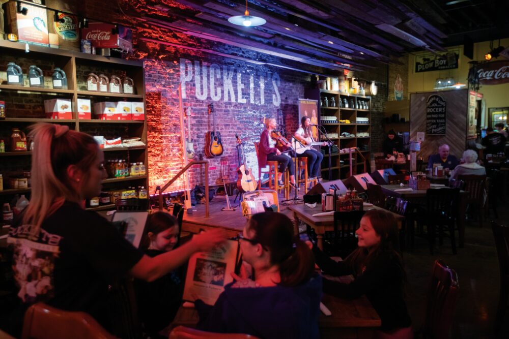 The Steel Blossoms music group performs for the dinnner crowd at Puckett's Grocery & Restaurant in downtown Murfreesboro, Tennessee.