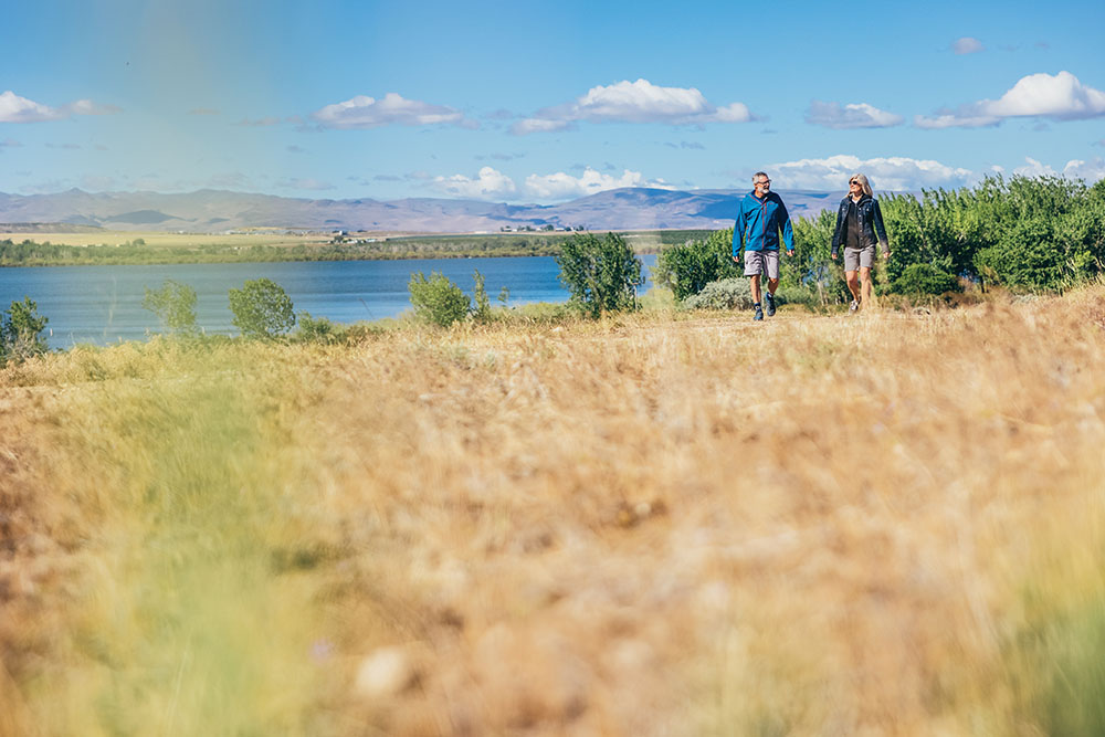 A couple walks through Deer Flat National Wildlife Refuge near Nampa, ID.