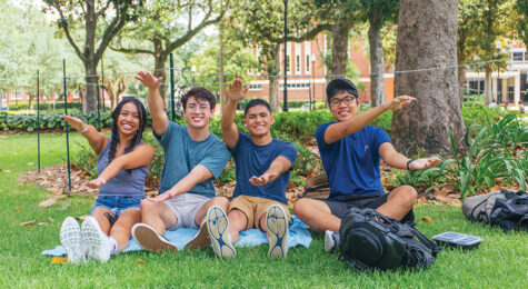 Florida students do the popular Gator chomp cheer.