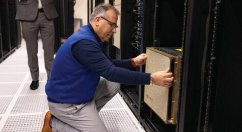 Elias Eldayrie, UF vice president and chief information officer, installs an NVIDIA DGX B200 node as part of the latest HiPerGator upgrade.