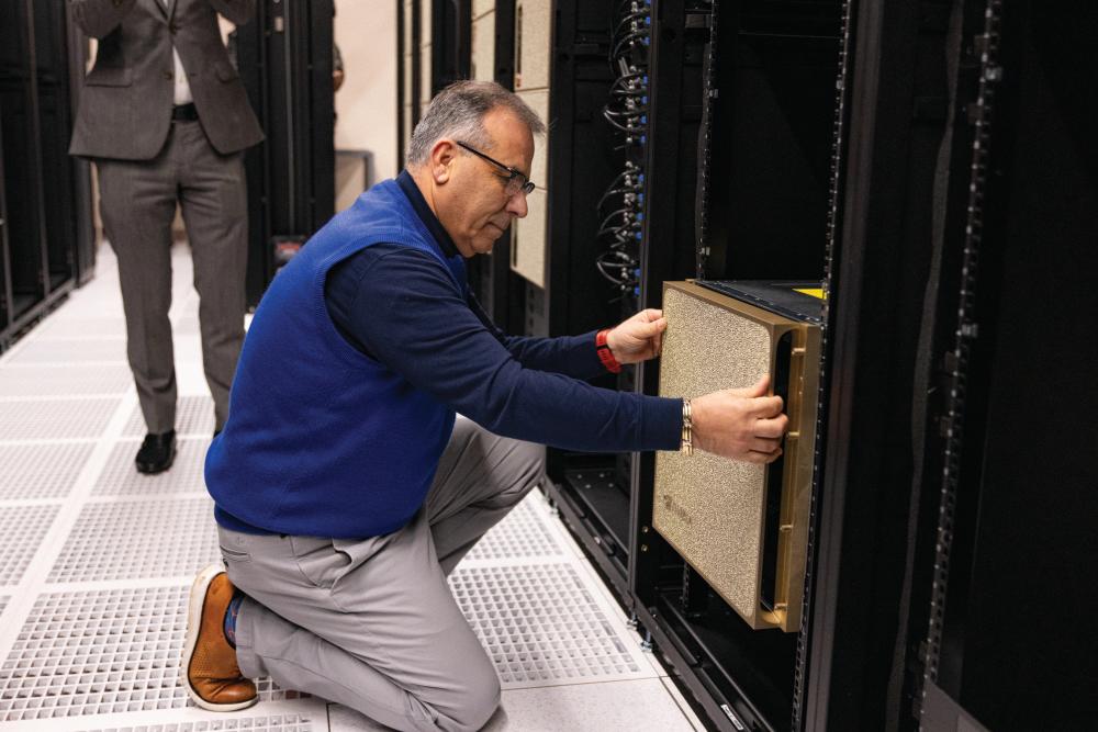 Elias Eldayrie, UF vice president and chief information officer, installs an NVIDIA DGX B200 node as part of the latest HiPerGator upgrade.