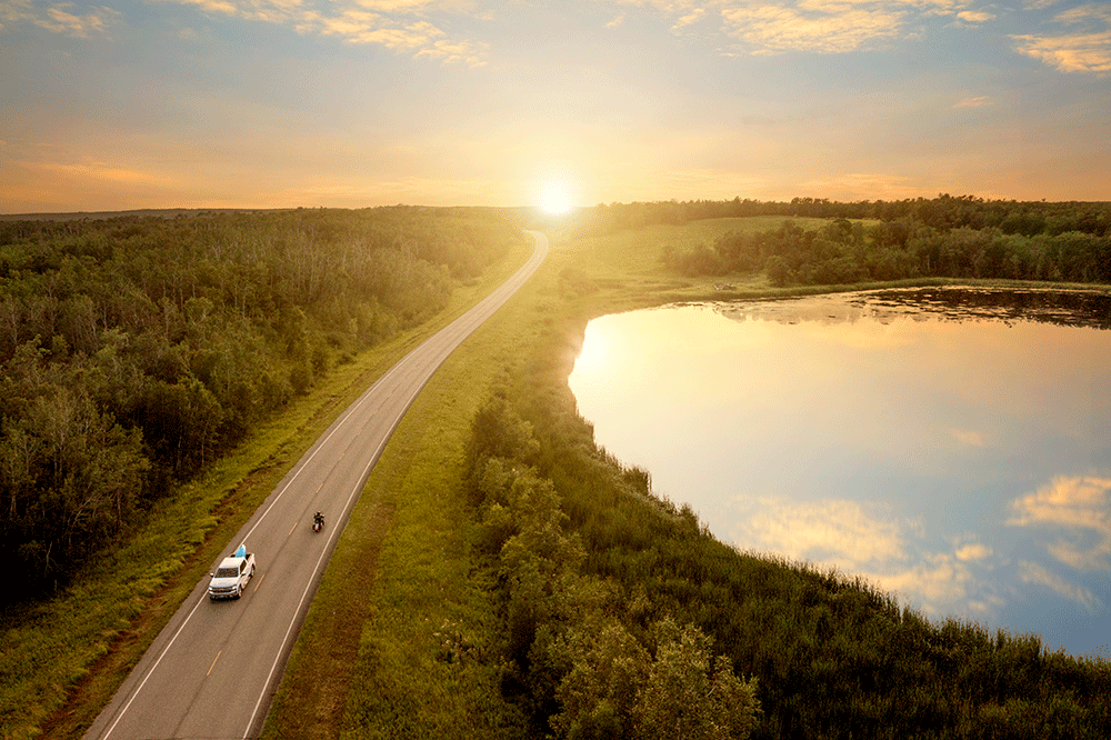 The open road is one of the best places to enjoy a sunset in North Dakota. 