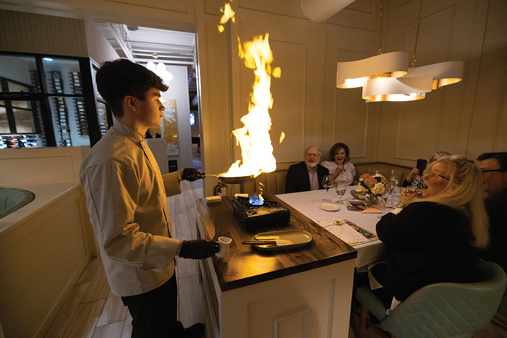 Jacob Grove makes Bananas Foster tableside at III Palms in Tyler, TX.