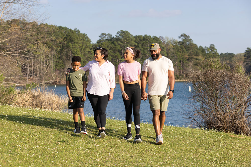 The Farr family, Suzetts (mother), Lehebron (father), Jett Legens (son), 9, and Aidyn Paige (daughter), 13, spend time at Tyler State Park in Tyler Texas.