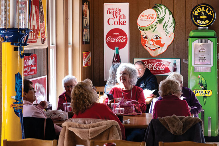 Visitors enjoy lunch at Cammack Station in Muncie, Indiana. Cammack Station is a stop on the Tenderloin Lovers Trail, which highlights the pok tenderloin sandwich, a beloved Midwestern dish.