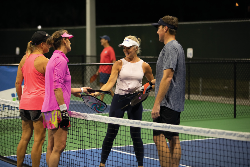 Pickelball players play a match on the courts at Pictona at Holly Hill in Daytona.