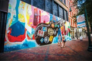 A mural called "The Sound of Memphis" by artists Damon Lamar Reed and Pugs Atomz is located on Main Street in Memphis, Tennessee.