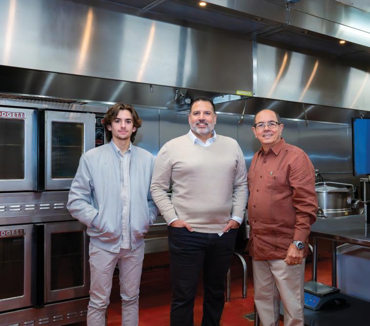 Mi Apá Latin Café owner Peter Ynigo with his father and son.