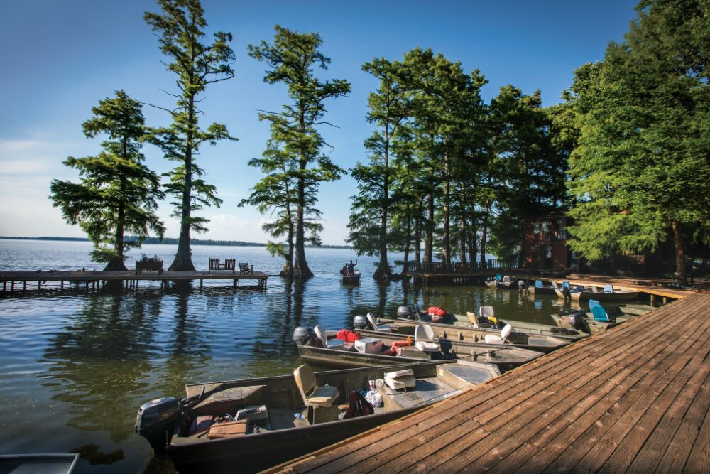 Fishing boats are tied to the docks in front of the lodge at Blue Bank Resort on Reelfoot Lake in Hornbeak, Tennessee.
