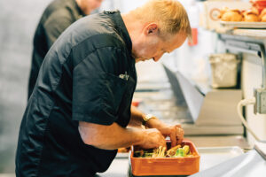 Chef Colin Smith prepares dishes for his business, Roundabout Catering & Party Rentals, in Reno, NV.